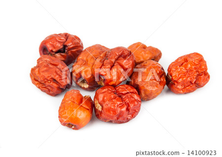 Close up and selective focus on the dried Chinese Red Dates at the foreground Close up and selective focus on the dried Chinese Red Dates at the foreground 14100923