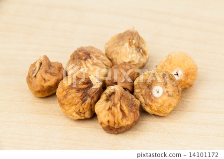 Close up and selective focus on the dried figs at the foreground 14101172