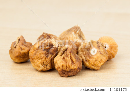 Close up and selective focus on the dried figs at the foreground 14101173