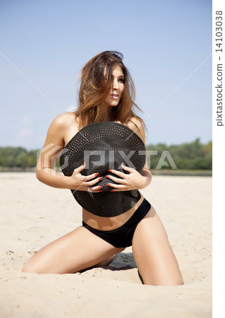 beautiful brunette woman in pink bikini beautiful brunette woman in pink bikini 14103038