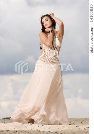 attractive and sensuality woman dancing in the desert attractive and sensuality woman dancing in the desert 14103039
