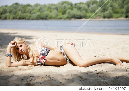 beautiful blonde woman in bikini beautiful blonde woman in bikini 14103697
