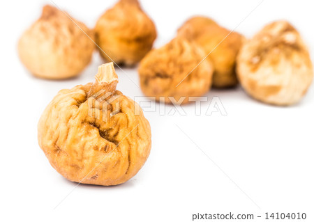 Close up and selective focus on the dried figs at the foreground 14104010