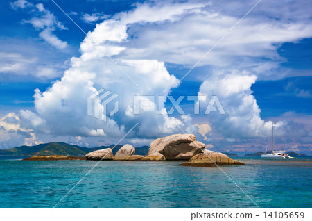 Tropical island at Seychelles and boats 14105659