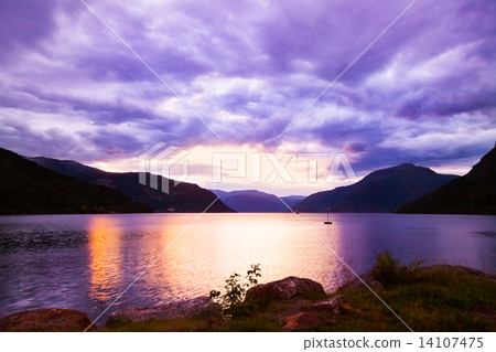 Sunset in fjord Hardanger Norway 14107475