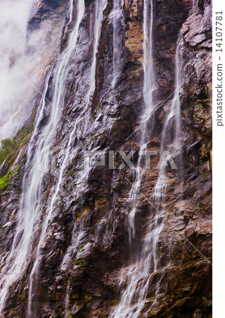 Waterfall in Geiranger fjord Norway Waterfall in Geiranger fjord Norway 14107781
