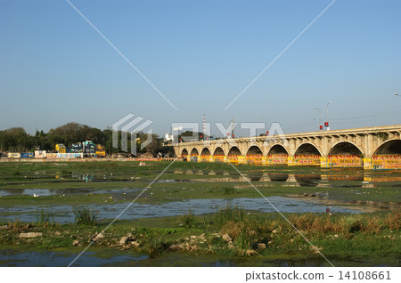 View of town from the river dried up and the bridge, South India, Kerala, Madurai View of town from the river dried up and the bridge, South India, Kerala, Madurai 14108661