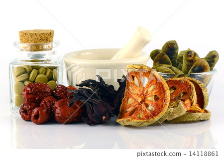 Herbal Medicine tablet and dried herbs. 14118861
