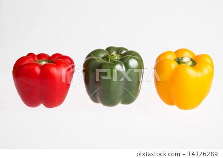 Red, green and yellow pepper on a white background 14126289