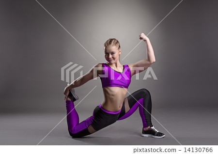Studio photo of smiling sports gymnast Studio photo of smiling sports gymnast 14130766