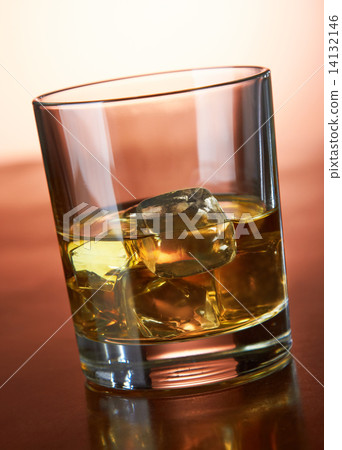 Whiskey with ice cubes on red Whiskey with ice cubes on red 14132146