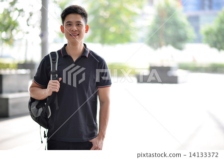 Young male adult student in campus Young male adult student in campus 14133372