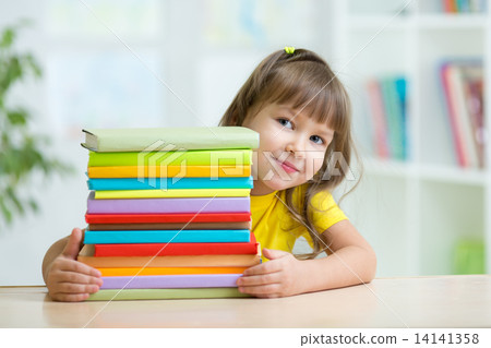 Smart kid girl preschooler with books 14141358