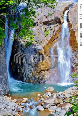 Waterfall of the Iwai River bathed in sunlight at the foot of Mount Kurikoma 14142265