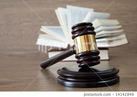 wooden gavel and books 14142849