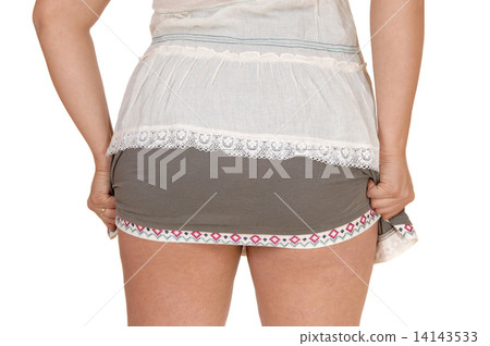 Woman's behind in skirt. Woman's behind in skirt. 14143533