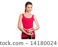 pretty fitness girl measuring her waist and smiling isolated 14180024