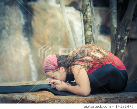 Practicing yoga Practicing yoga 14181475