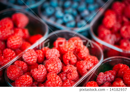 Baskets Full Of Raspberries And Blueberries On The Farmers Marke 14182937