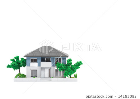 Miniature house on isolated white background Miniature house on isolated white background 14183082