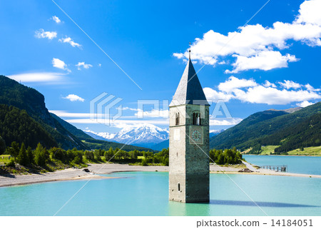 tower of sunken church in Resia lake, South Tyrol, Italy tower of sunken church in Resia lake, South Tyrol, Italy 14184051
