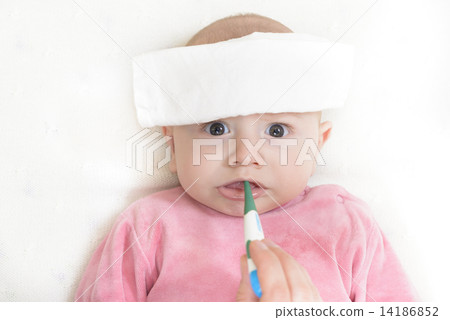 Checking temperature with digital thermometer 14186852