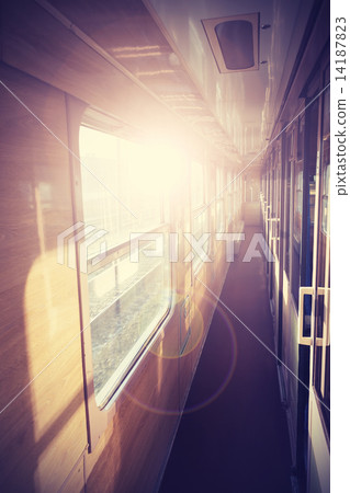 Retro filtered picture of a train coach interior. Retro filtered picture of a train coach interior. 14187823