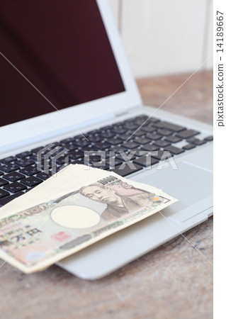Money and personal computer 14189667