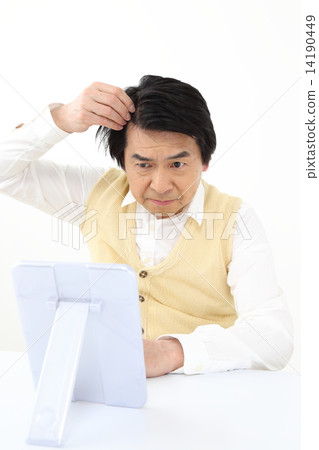 Middle-aged men who care about their hairline 14190449