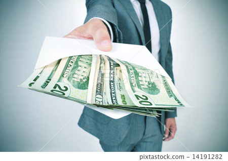 man giving an envelope full of american dollar bills 14191282