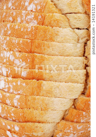 sliced pan de payes, a round bread typical of Catalonia, Spain sliced pan de payes, a round bread typical of Catalonia, Spain 14191321