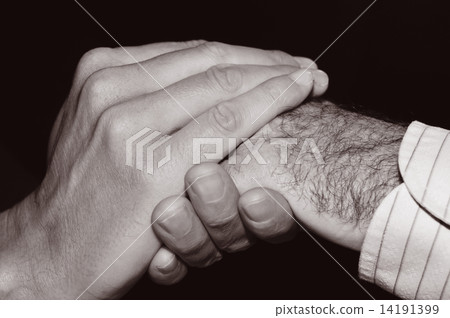 young man holding the hand of an old man, in black and white 14191399