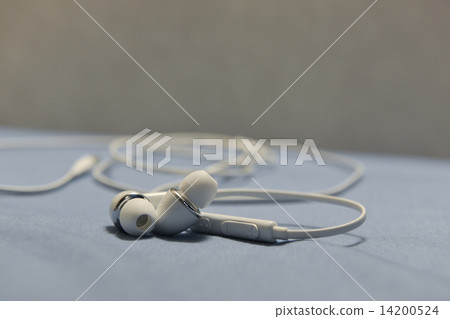 Close up or concept of digital music white Headphones. Close up or concept of digital music white Headphones. 14200524