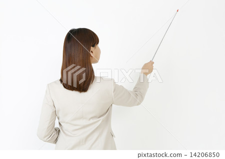 The back of a woman with an instruction stick The back of a woman with an instruction stick 14206850