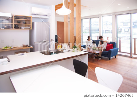 Four people relaxing in the living room 14207465