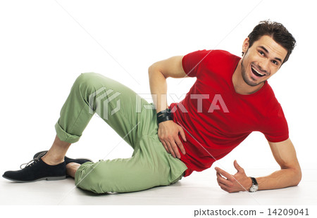 teenager lying on the floor, relaxing and laughing 14209041