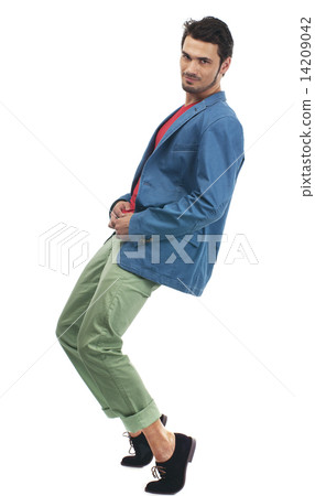 teenager leaned back, relaxing and laughing 14209042