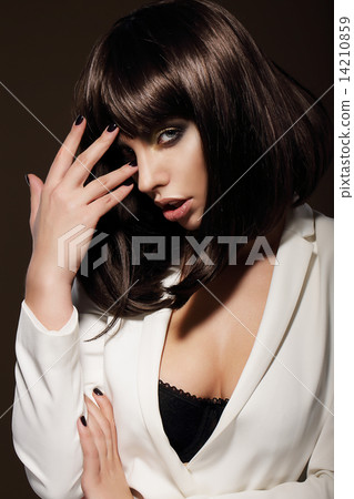 Seductive Young Woman with Dark Hair 14210859