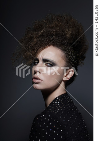 Individuality. Glamorous Brunette with Curly Hair 14210868
