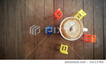 Coffee cup or fresh coffee on wooden table in morning time. Coffee cup or fresh coffee on wooden table in morning time. 14213768