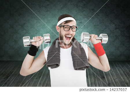Composite image of geeky hipster lifting dumbbells in sportswear 14237037