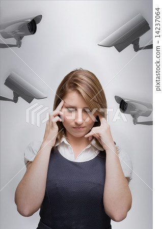 Composite image of businesswoman with headache 14237064