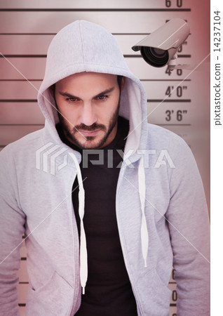 Composite image of portrait of dangerous man wearing hooded jack 14237104