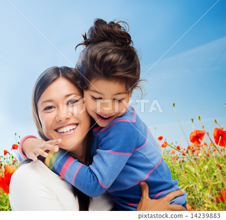 happy mother and daughter hugging happy mother and daughter hugging 14239883
