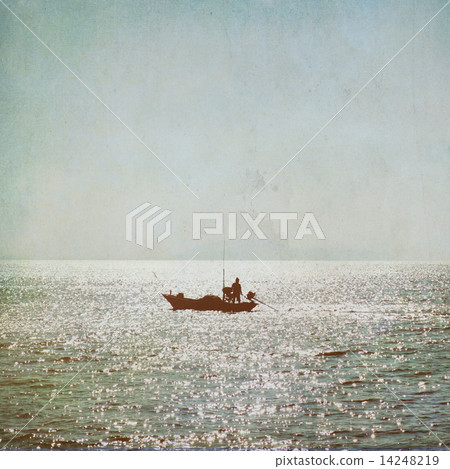 The silhouette of fisherman with boat in the sea vintage backgro The silhouette of fisherman with boat in the sea vintage backgro 14248219