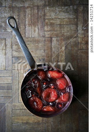 poached prunes and cherries in pot poached prunes and cherries in pot 14251714