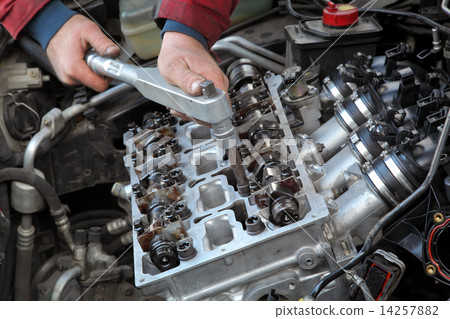 Automotive, cylinder head servicing 14257882