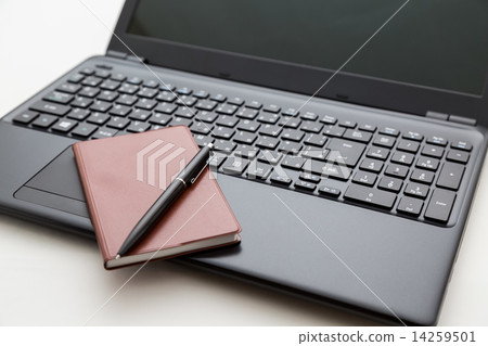 Laptop computer and notebook and ballpoint pen Laptop computer and notebook and ballpoint pen 14259501