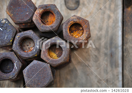 Old bolts or dirty bolts on wooden background, Machine equipment in industry work. 14261028