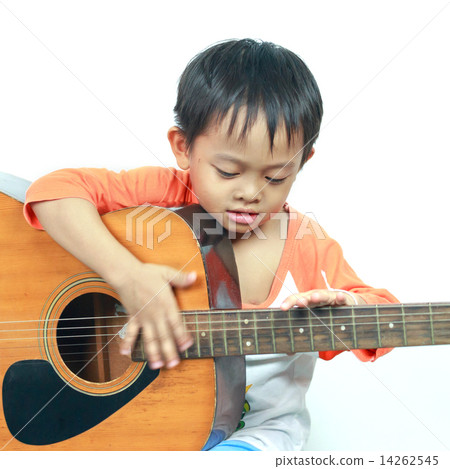 Little boy playing acoustic guitar Little boy playing acoustic guitar 14262545